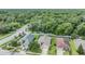 Aerial view of homes with lush green surroundings at 13235 Meadow Golf Ave, Hudson, FL 34669