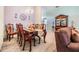 Elegant dining room with a formal table and chairs at 13235 Meadow Golf Ave, Hudson, FL 34669