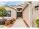 Welcoming front entry with walkway and landscaping at 13235 Meadow Golf Ave, Hudson, FL 34669