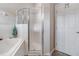 Large walk-in shower with glass enclosure at 13235 Meadow Golf Ave, Hudson, FL 34669