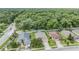 Aerial view of homes with lush green surroundings at 13235 Meadow Golf Ave, Hudson, FL 34669