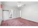 Inviting bedroom with en suite bathroom, providing convenience and privacy at 12501 Ulmerton Rd # 131, Largo, FL 33774