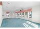 Large living area showcasing an open layout, natural light, and neutral color scheme at 12501 Ulmerton Rd # 131, Largo, FL 33774