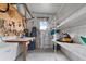 Well-organized storage area with shelving and a workbench at 12501 Ulmerton Rd # 131, Largo, FL 33774