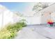 Private backyard with a white fence and gate at 8114 N Edison Ave, Tampa, FL 33604