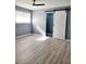 Spacious bedroom with ceiling fan and barn door closet at 8114 N Edison Ave, Tampa, FL 33604