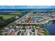 Aerial view showcasing a home's location in a neighborhood at 16005 Cape Coral Dr, Wimauma, FL 33598