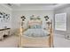 Serene bedroom with a post bed, nightstands, and natural light at 16005 Cape Coral Dr, Wimauma, FL 33598