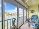 Relaxing sunroom with water views and comfortable seating at 7420 Bay Island S Dr # 275, South Pasadena, FL 33707