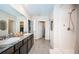 Spa-like bathroom with double vanity and shower at 8367 Ender Hills Dr, Wesley Chapel, FL 33545