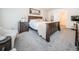 Comfortable bedroom with king bed and sitting area at 8367 Ender Hills Dr, Wesley Chapel, FL 33545