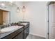 Double vanity bathroom with granite countertop at 8367 Ender Hills Dr, Wesley Chapel, FL 33545