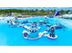 Crystal Lagoon with inflatable water park at 8367 Ender Hills Dr, Wesley Chapel, FL 33545