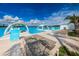 Relaxing community pool with lounge chairs and shaded areas at 8367 Ender Hills Dr, Wesley Chapel, FL 33545