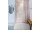 Shower with bench and neutral color scheme at 8367 Ender Hills Dr, Wesley Chapel, FL 33545