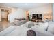 Spacious living room with comfortable seating and large TV at 8367 Ender Hills Dr, Wesley Chapel, FL 33545