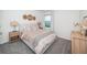 Cozy bedroom with neutral decor and ample natural light at 8367 Ender Hills Dr, Wesley Chapel, FL 33545