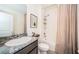 Clean bathroom featuring a tub shower combo and granite vanity at 8367 Ender Hills Dr, Wesley Chapel, FL 33545