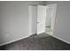 Bedroom with gray walls and carpet flooring at 36131 Pine Bluff Loop, Dade City, FL 33525