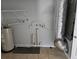 Laundry room with water heater and HVAC unit at 36131 Pine Bluff Loop, Dade City, FL 33525