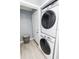Stackable washer and dryer in a dedicated laundry room at 8114 N Edison Ave, Tampa, FL 33604