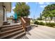 Back deck with stairs, seating and storage at 8212 Forest Cir, Seminole, FL 33776
