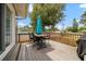 Outdoor patio with table and chairs, perfect for dining al fresco at 8212 Forest Cir, Seminole, FL 33776