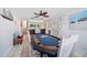 Game room with poker table and access to the bar area at 8212 Forest Cir, Seminole, FL 33776
