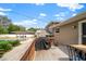 Back deck with grill and seating area, overlooking a pool and backyard at 8212 Forest Cir, Seminole, FL 33776