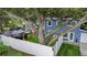 Backyard with a gazebo, tree swing, and playset, shaded by mature trees at 733 1/2 New Jersey St, Clearwater, FL 33756