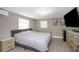 Serene bedroom with neutral tones, a ceiling fan, and ample natural light at 733 1/2 New Jersey St, Clearwater, FL 33756