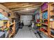 The garage is long and narrow with storage shelves lining the walls at 733 1/2 New Jersey St, Clearwater, FL 33756