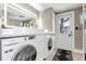 Chic laundry area features a modern sink, sleek counter, and direct access to the exterior at 733 1/2 New Jersey St, Clearwater, FL 33756