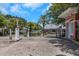 Gated community entrance with security features at 105 Pompano Se Dr # A, St Petersburg, FL 33705