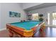 Well-equipped game room featuring a large pool table at 105 Pompano Se Dr # A, St Petersburg, FL 33705