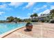 Resort-style pool with brick deck and lounge chairs at 105 Pompano Se Dr # A, St Petersburg, FL 33705