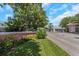 Waterside community entrance with lush landscaping at 105 Pompano Se Dr # A, St Petersburg, FL 33705