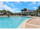 Inviting community pool with ample deck space at 105 Pompano Se Dr # A, St Petersburg, FL 33705