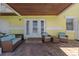 Ground level patio with wicker seating and a built-in grill at 105 Pompano Se Dr # A, St Petersburg, FL 33705