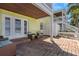 Spacious patio with comfortable seating and a view of neighboring buildings at 105 Pompano Se Dr # A, St Petersburg, FL 33705