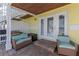 Relaxing patio featuring wicker seating and a built-in grill at 105 Pompano Se Dr # A, St Petersburg, FL 33705