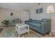 Cozy living room with sofa and coffee table, near the entryway at 105 Pompano Se Dr # A, St Petersburg, FL 33705