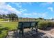 Relax by the lake on a park bench at 105 Pompano Se Dr # A, St Petersburg, FL 33705