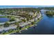 Wide aerial showcasing the community and property's waterfront access at 105 Pompano Se Dr # A, St Petersburg, FL 33705