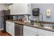 Well-equipped community kitchen with stainless steel appliances at 105 Pompano Se Dr # A, St Petersburg, FL 33705