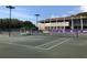 Well-maintained tennis courts near clubhouse at 36750 Us Highway 19 N # 05102, Palm Harbor, FL 34684
