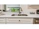 Condo kitchen sink with a view at 36750 Us Highway 19 N # 05102, Palm Harbor, FL 34684