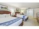 Bedroom with two twin beds and dresser at 36750 Us Highway 19 N # 05102, Palm Harbor, FL 34684