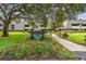 Building exterior with landscaping and walkway at 36750 Us Highway 19 N # 05102, Palm Harbor, FL 34684