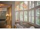 Relaxing spa lounge with large windows and comfortable seating at 36750 Us Highway 19 N # 05102, Palm Harbor, FL 34684
